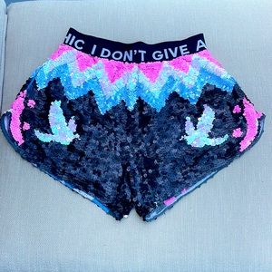 House of Mua Mua sequin shorts. Size medium. Black, pink, silver, white
